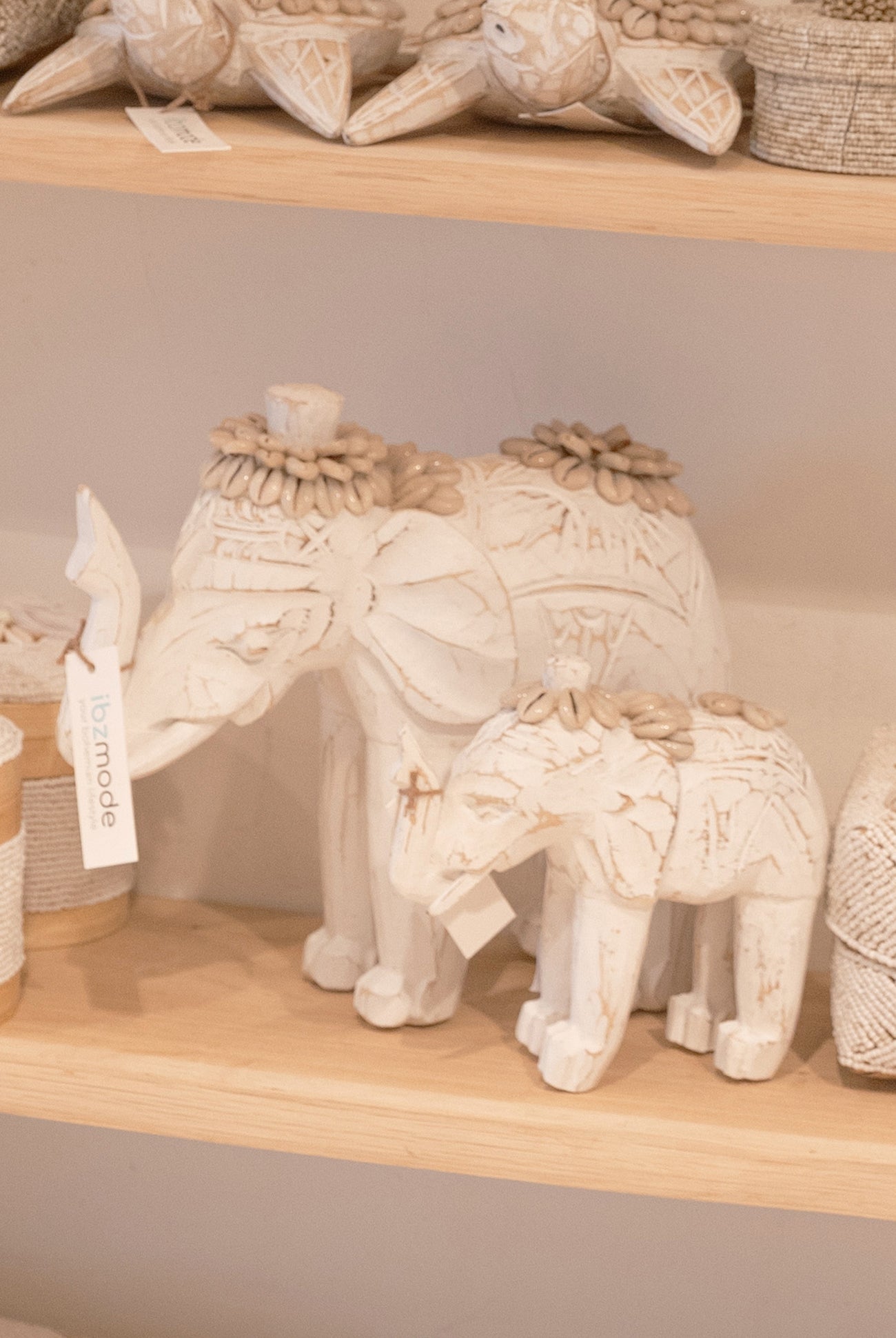 Ibizamode handcrafted white elephant decor with shell details in bohemian interior
