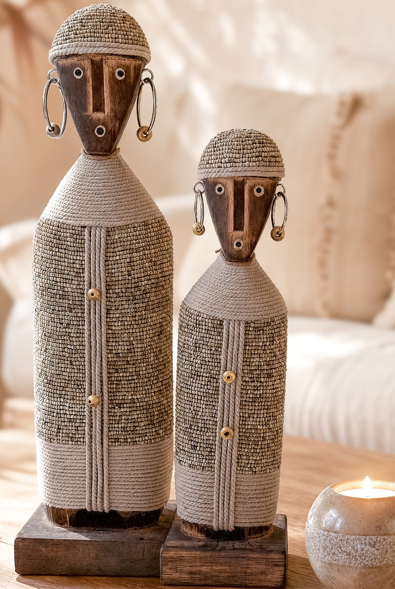 Ibizamode handcrafted nomad beaded doll in natural bohemian interior styling