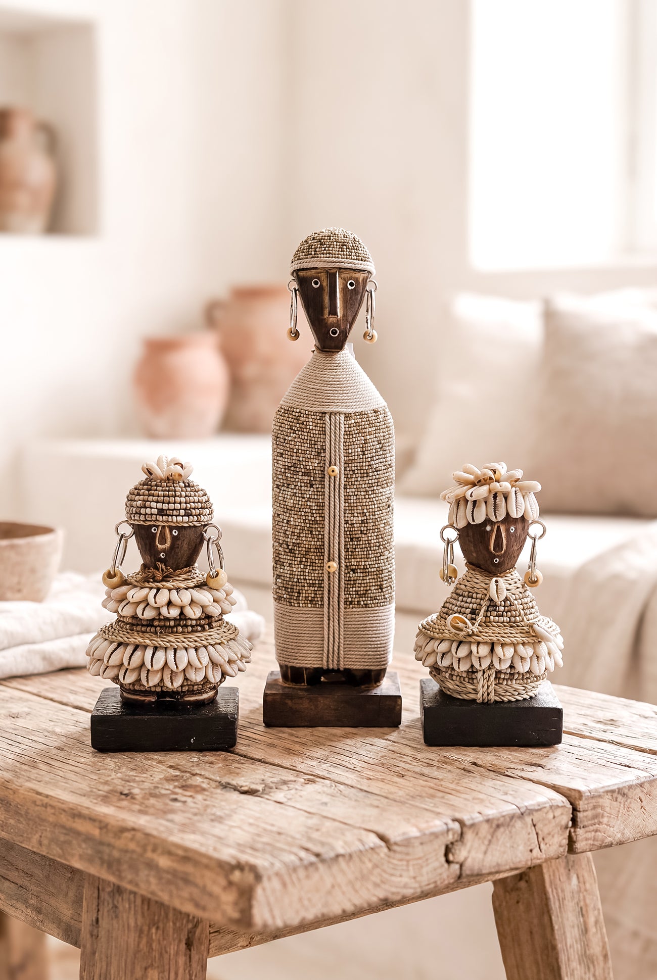 Ibizamode handcrafted nomad beaded doll in natural bohemian interior styling
