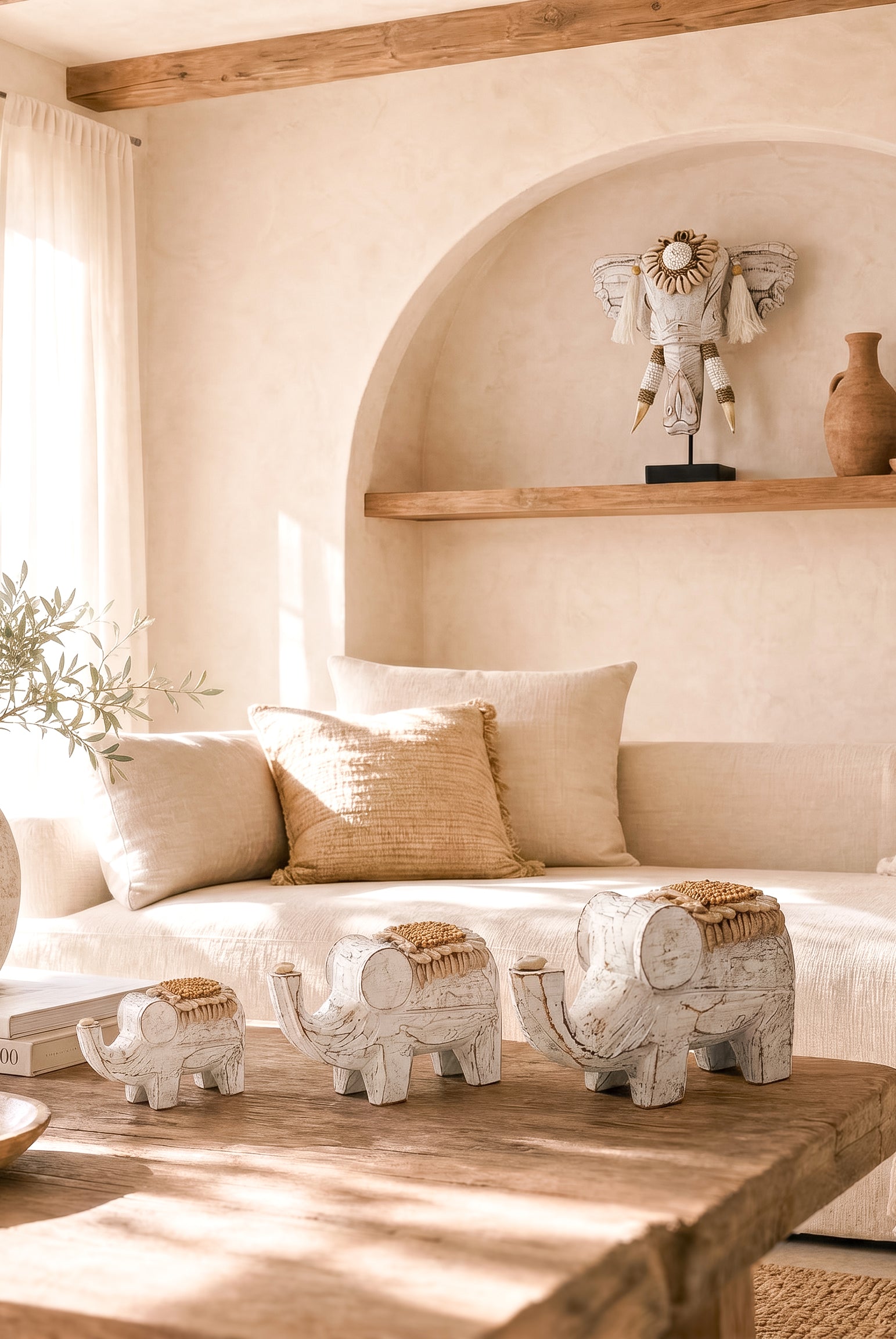 Ibizamode handcrafted wooden elephant decor in natural bohemian interior