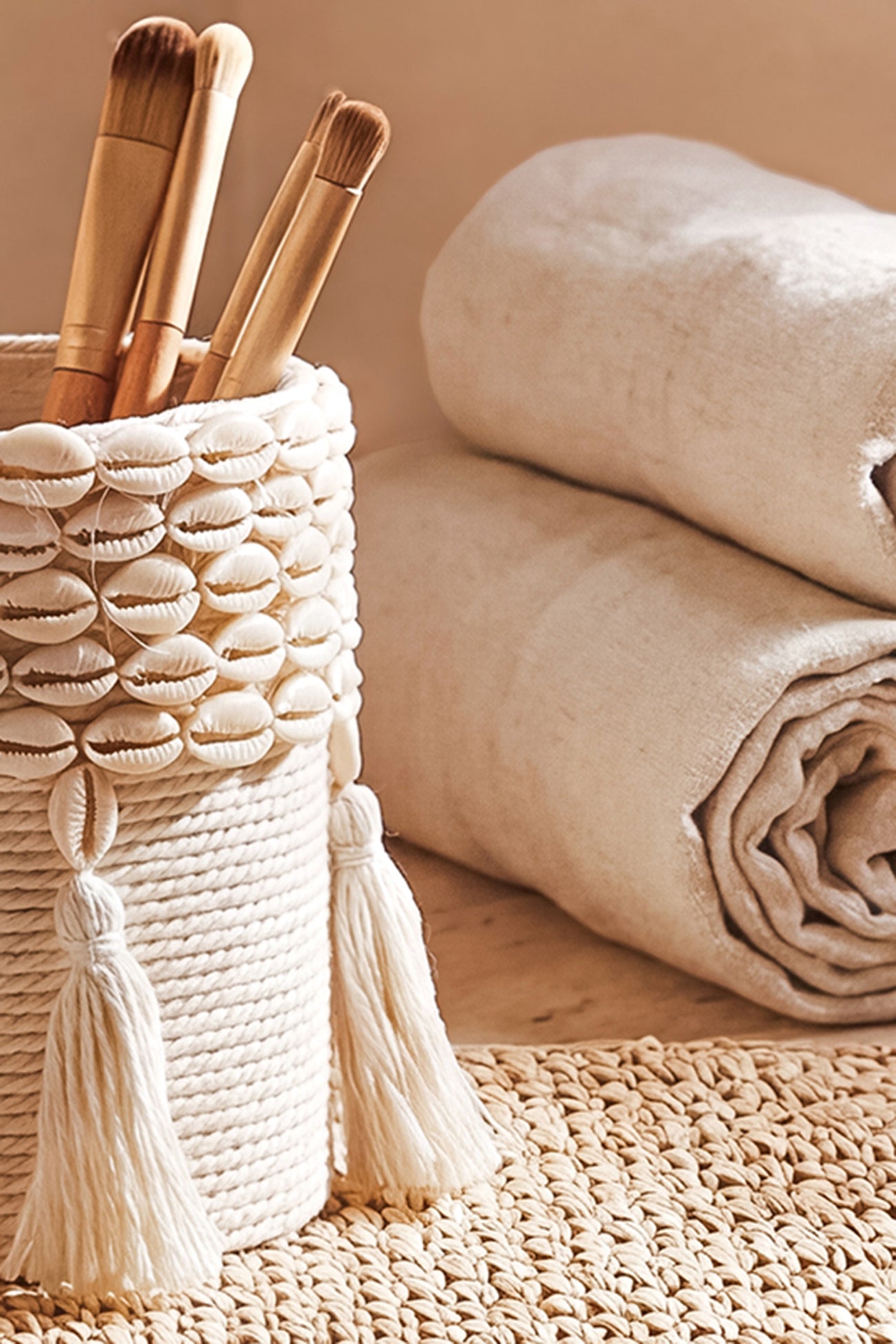 Ibizamode small handcrafted basket with shell details in bohemian bathroom interior