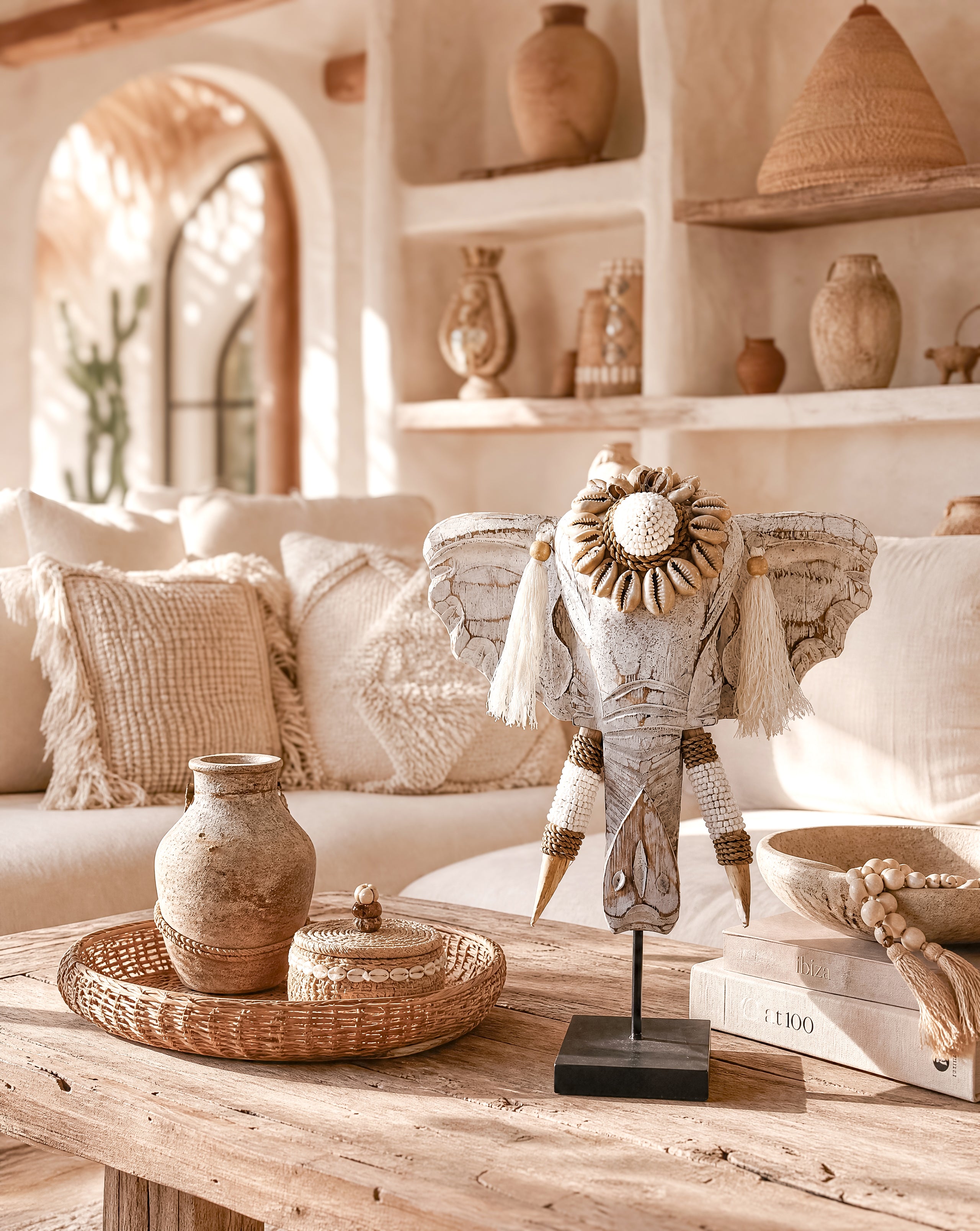 Ibizamode handcrafted white wooden elephant decor with shells and tassels in bohemian interior