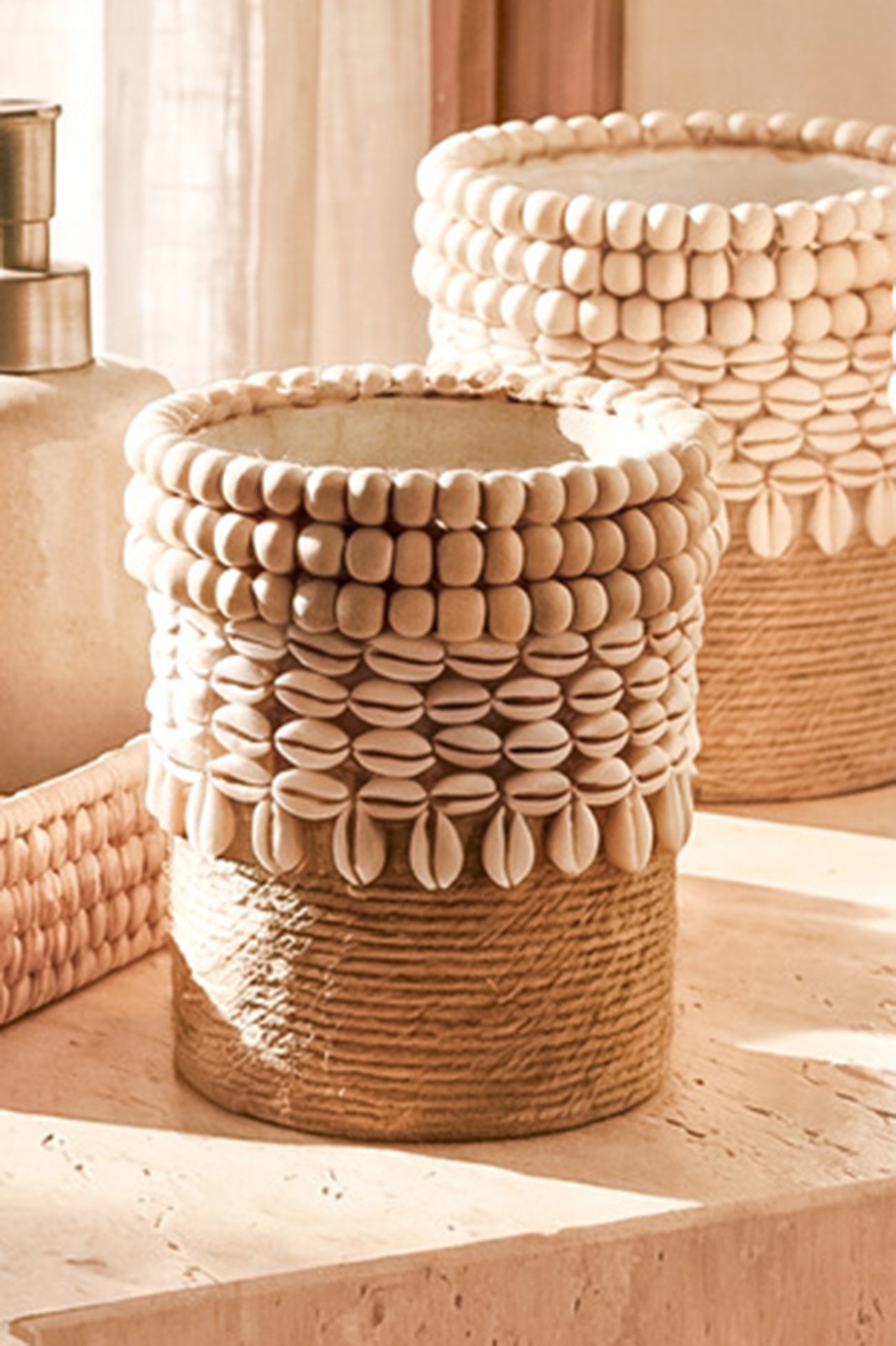 Ibizamode small handmade basket with shell details in bohemian bathroom interior