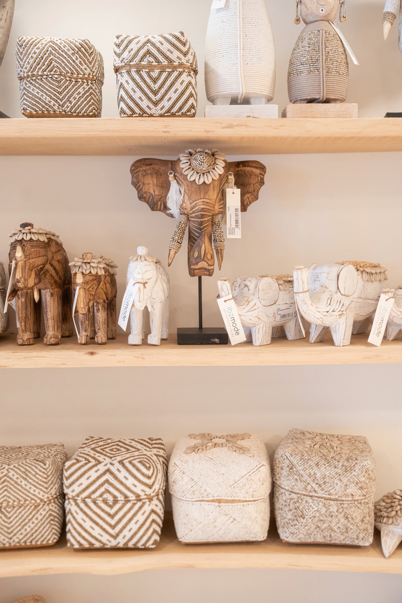 Ibizamode handcrafted wooden elephant decor with shells and tassels in bohemian interior