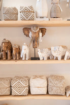 Ibizamode handcrafted wooden elephant decor with shells and tassels in bohemian interior