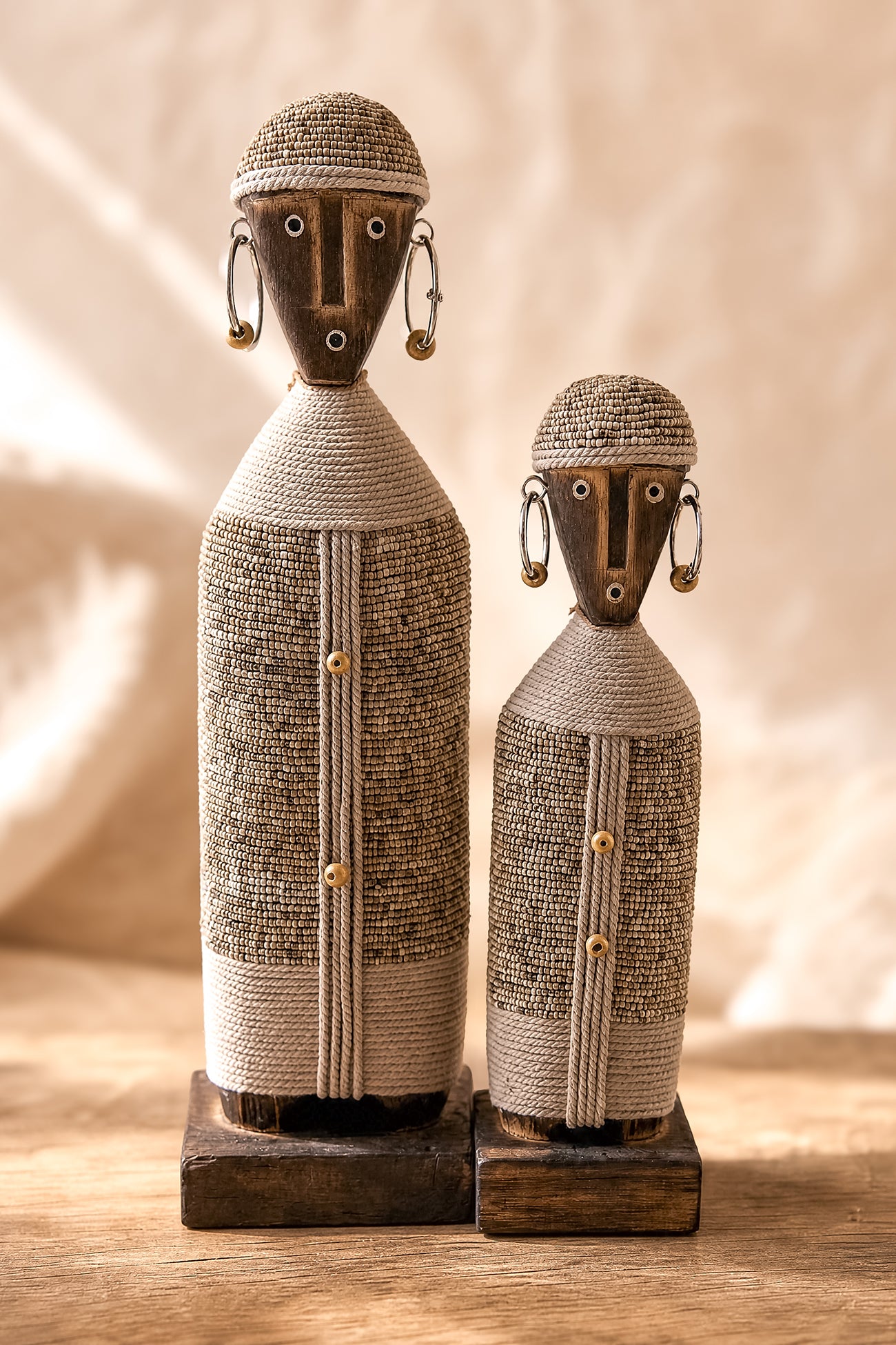 Ibizamode handcrafted nomad beaded doll in natural bohemian interior styling