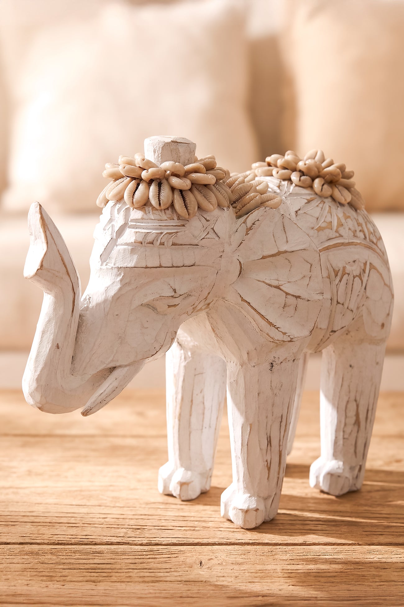 Ibizamode handcrafted white elephant decor with shell details in bohemian interior