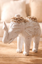 Ibizamode handcrafted white elephant decor with shell details in bohemian interior