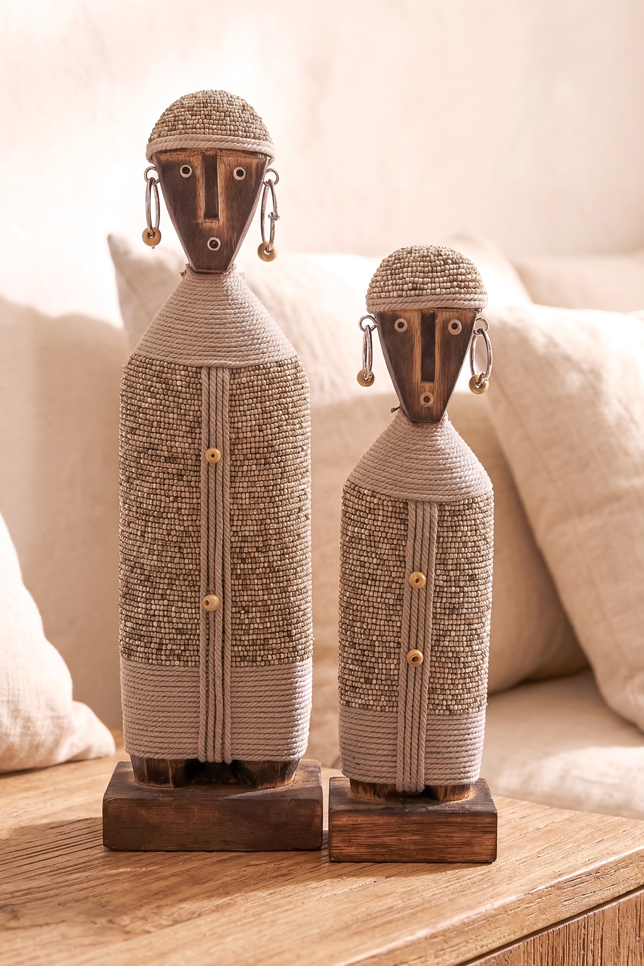Ibizamode handcrafted nomad beaded doll in natural bohemian interior styling