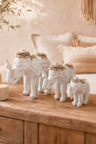 Ibizamode handcrafted white elephant decor with shell details in bohemian interior