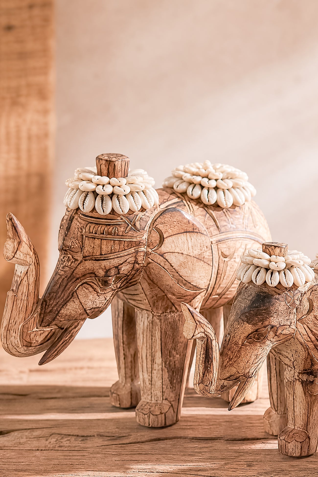 Ibizamode handcrafted wooden elephant decor with shell details in bohemian interior