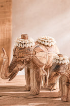 Ibizamode handcrafted wooden elephant decor with shell details in bohemian interior