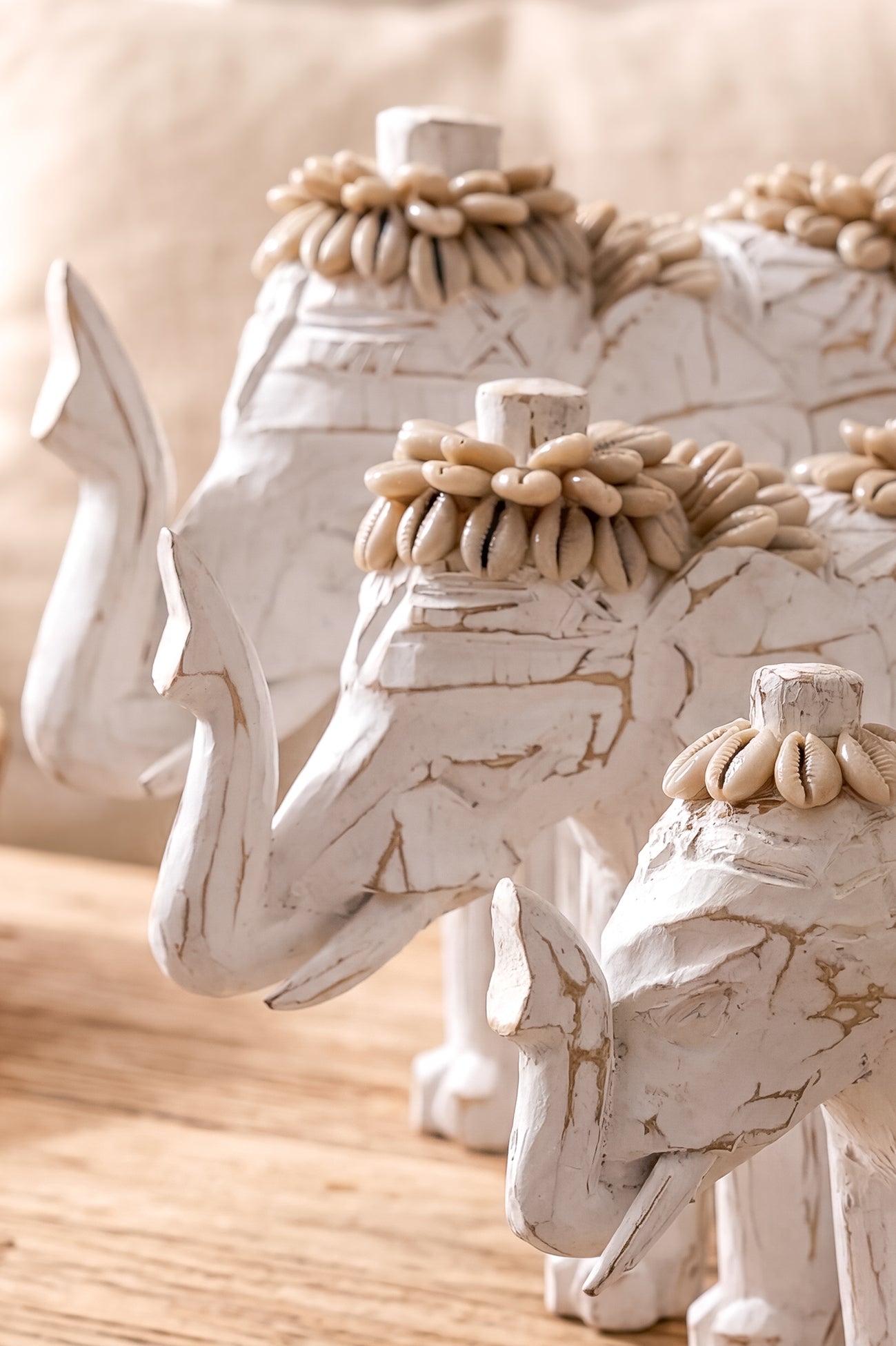 Ibizamode handcrafted white elephant decor with shell details in bohemian interior