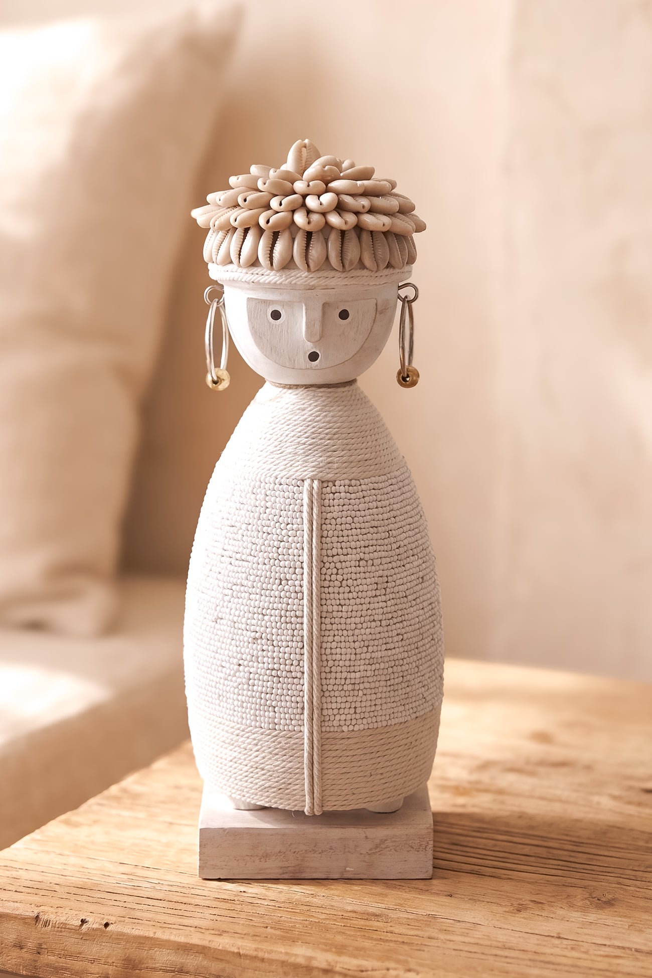 Ibizamode handcrafted white boho soul doll with shell details in bohemian interior