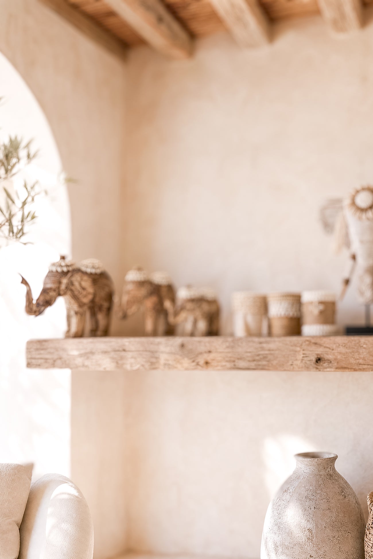Ibizamode handcrafted wooden elephant decor with shell details in bohemian interior