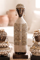 Ibizamode handcrafted nomad beaded doll in natural bohemian interior styling