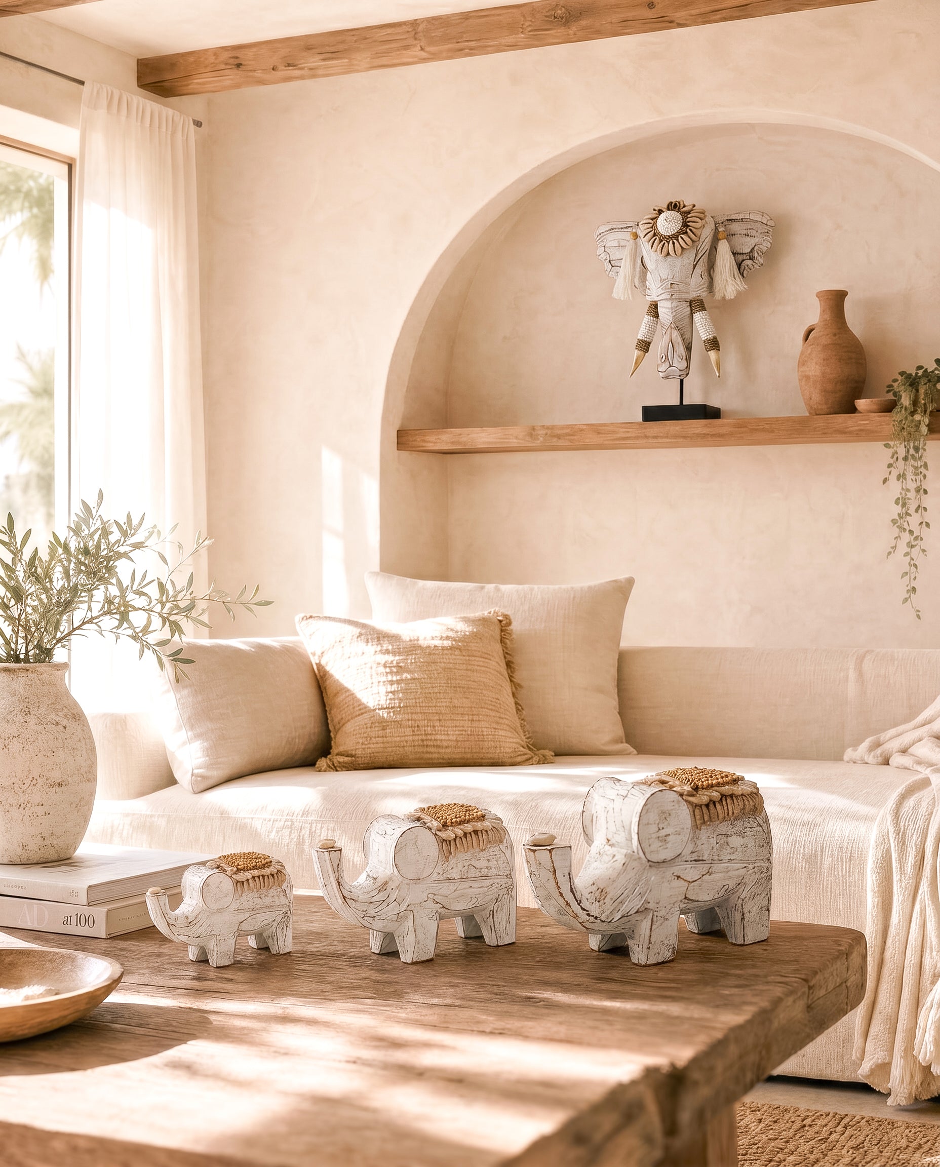 Ibizamode handcrafted wooden elephant decor in natural bohemian interior