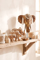 Ibizamode handcrafted wooden elephant decor with shell details in bohemian interior