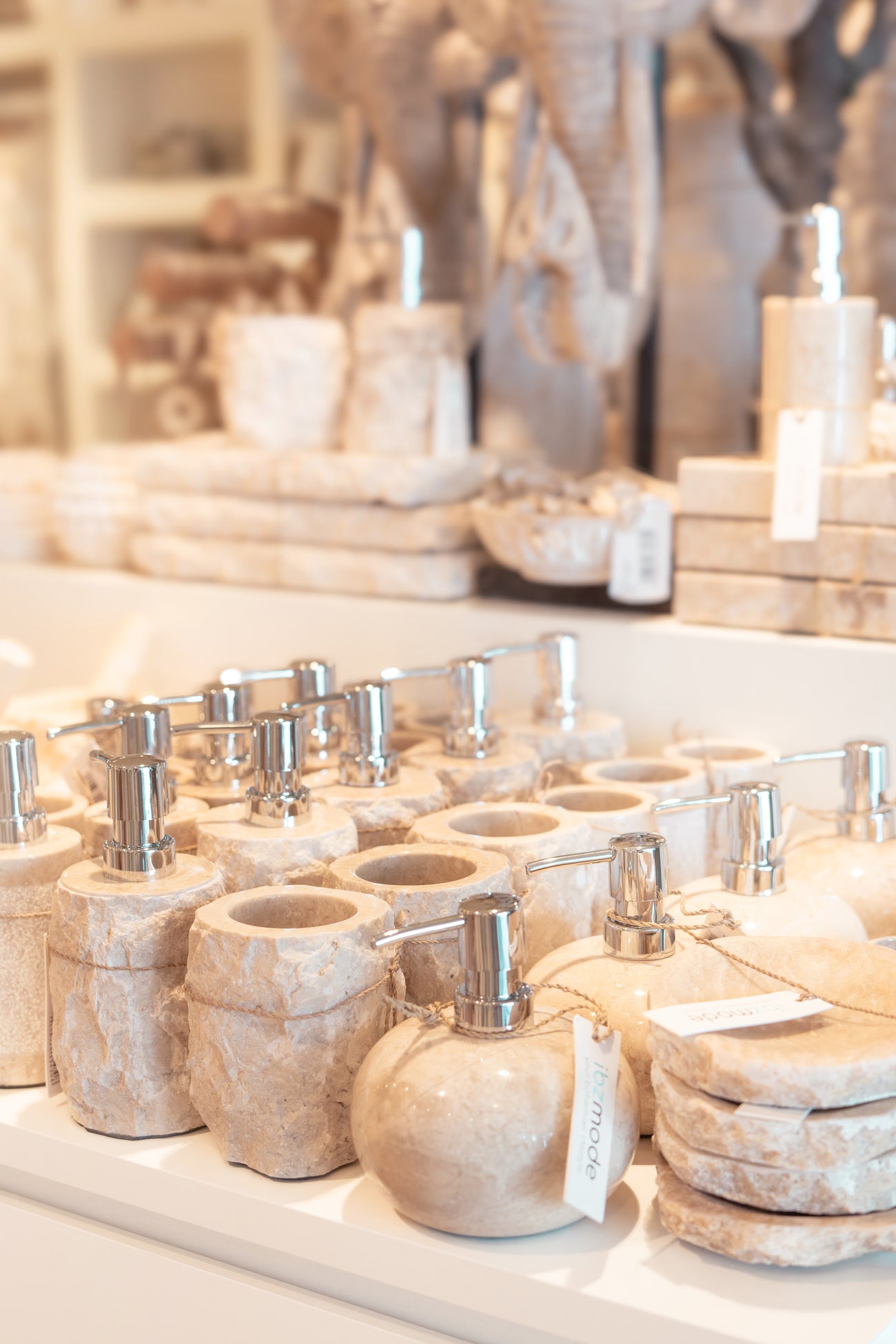 Ibizamode natural stone soap dispenser with silver pump in luxury bohemian bathroom interior