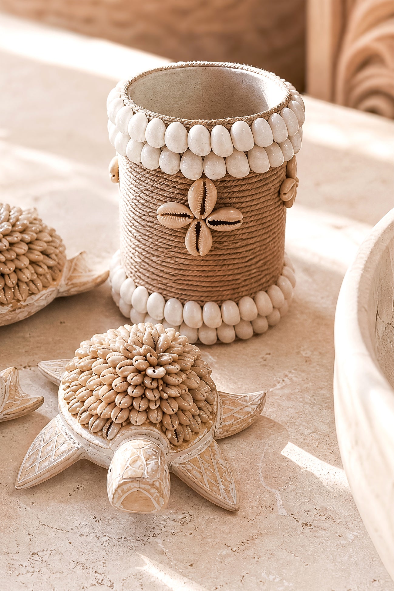 Ibizamode small handmade basket with shell details in bohemian bathroom styling
