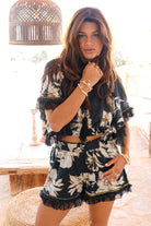 Ibizamode Bohemian Bloom black floral Ana top with lace and tassel neckline