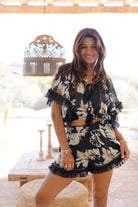 Ibizamode Bohemian Bloom black floral Ana top with lace and tassel neckline