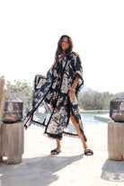 Ibizamode Bohemian Bloom black floral fringe kimono with flowing silhouette