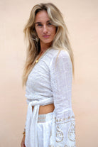 Ibzmode Wrap Top Darcia Lunara White with subtle shimmer detail